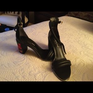 Black women summer shoes with ankle straps.